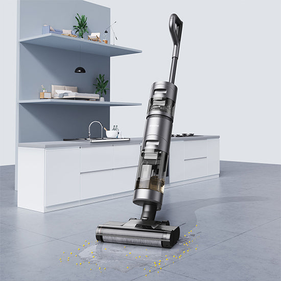 Dreame H11 Max cordless hard floor cleaner, gray, cleaning yellow spills on gray tile floor.
