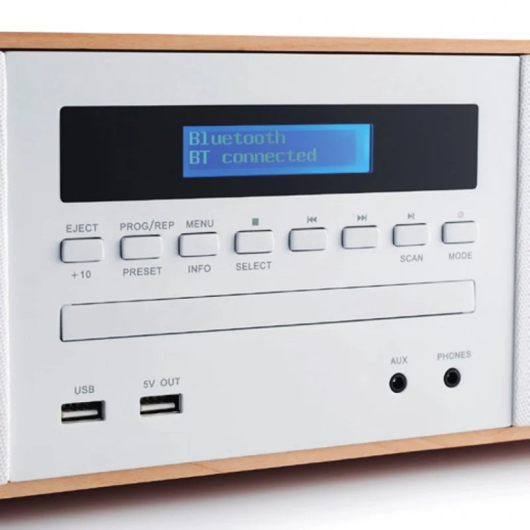 Thomson white micro hi-fi system with Bluetooth, wood trim, and control panel.