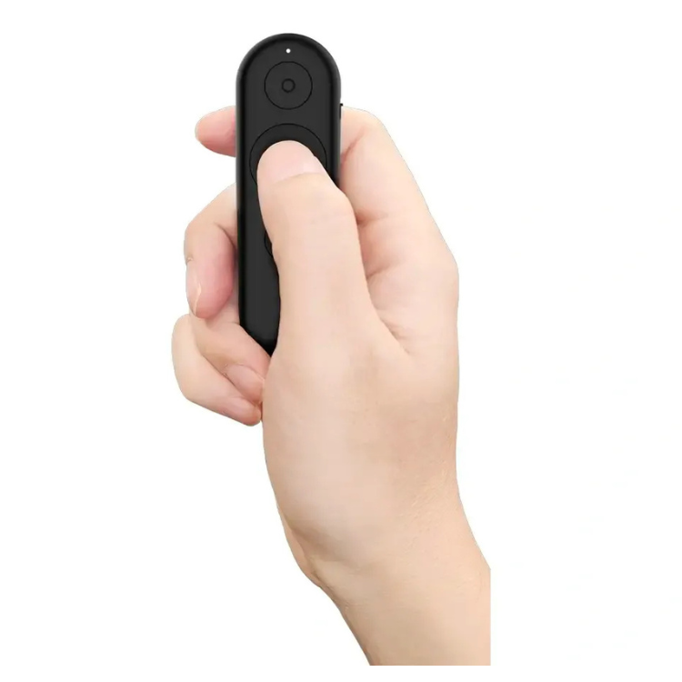 Black Lenovo wireless presentation clicker in a hand.