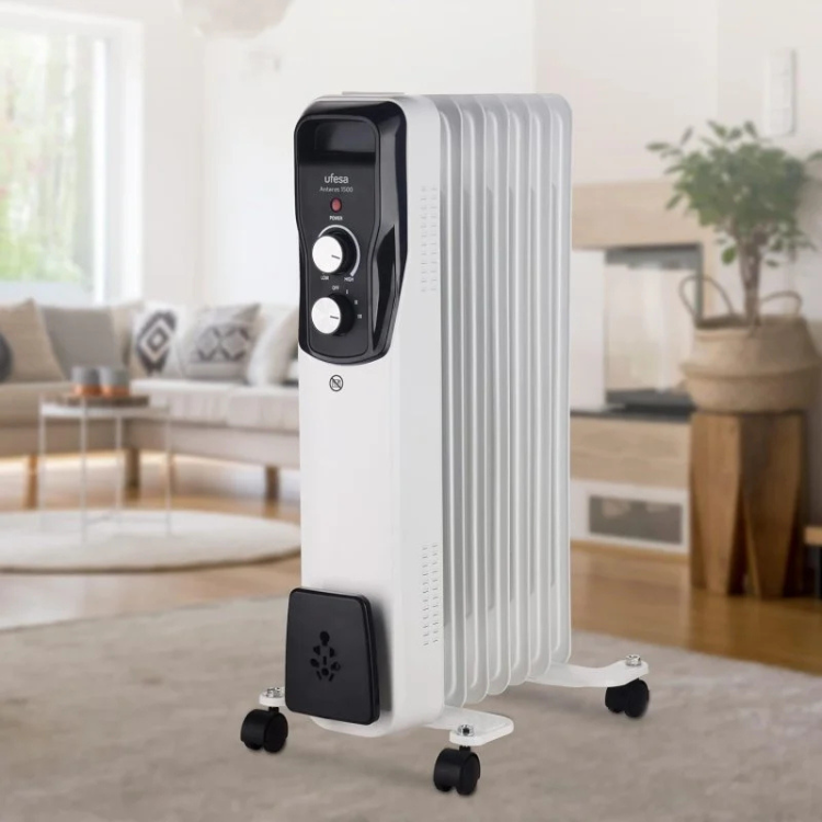 Ufesa Antares 1500 oil heater, white with black control panel and wheels.