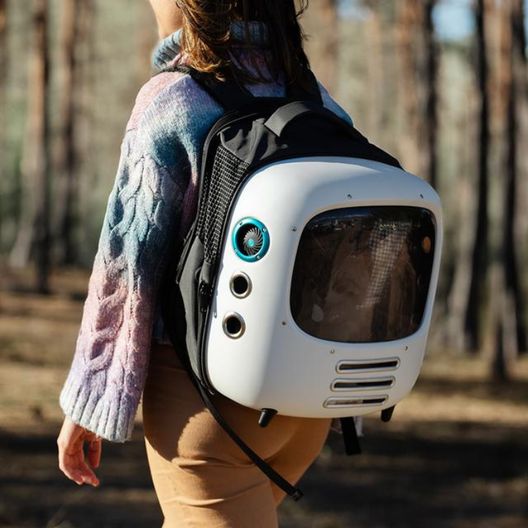 White Cecotec Pumba 1800 pet carrier backpack with black straps and blue accents.