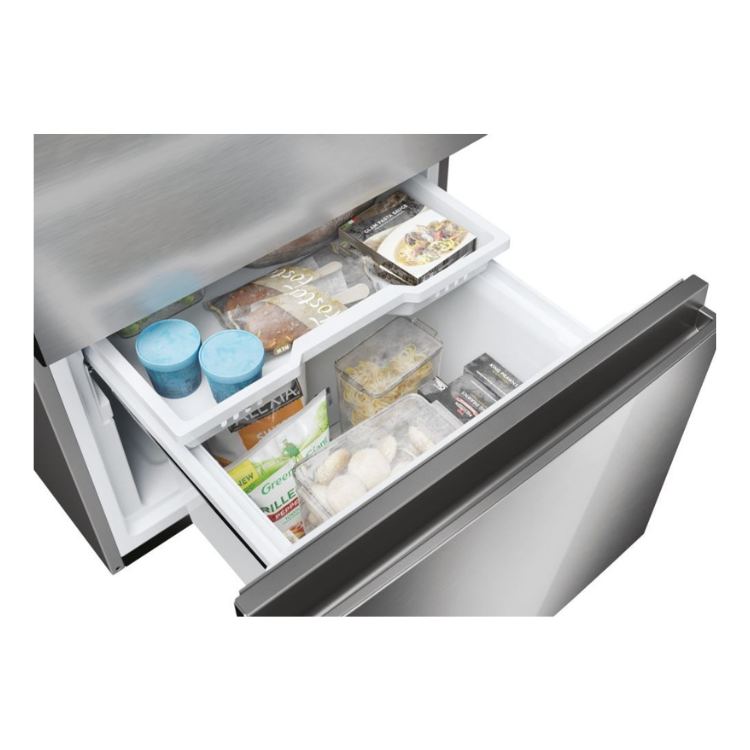 Haier fridge freezer drawer open, showing food storage, silver finish.