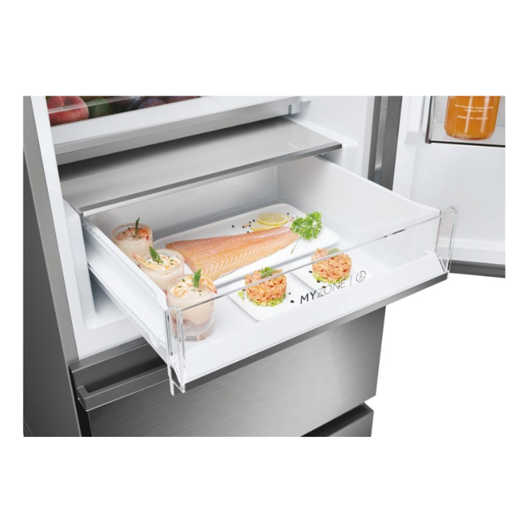 Haier fridge freezer drawer with food, fish, and MyZone label.