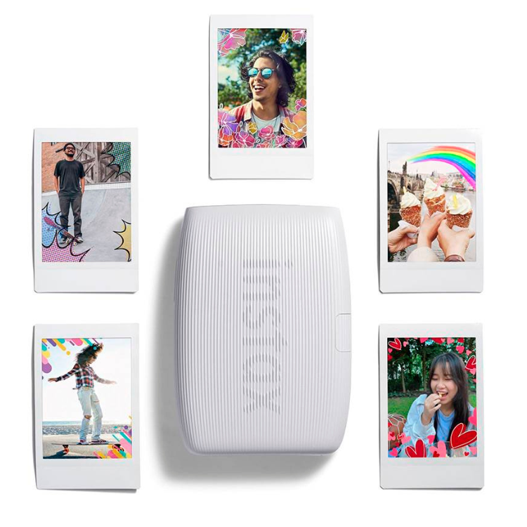 White Fujifilm Instax Mini Link 3 instant printer with photos.
