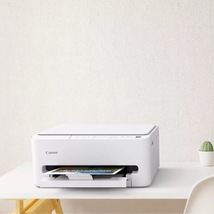 Canon Pixma TS4150i white inkjet printer on a table.