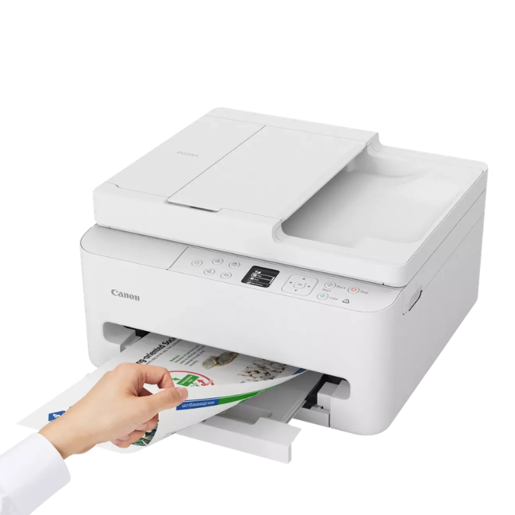 Canon Pixma TS7550i white inkjet printer with hand retrieving printed paper