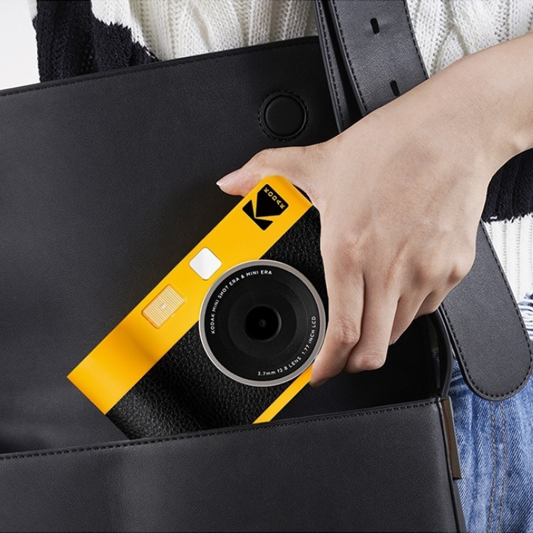 Yellow Kodak Mini Shot 2 Era MS200 camera in a black bag.