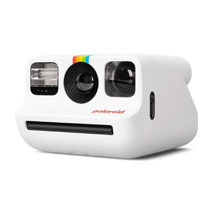 White Polaroid instant camera, rainbow stripe, red logo, black lens and buttons.