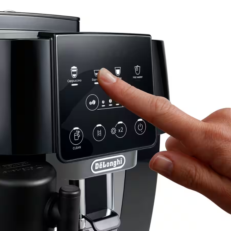 Black De'Longhi Magnifica Start LatteCrema coffee machine control panel with hand pressing button.