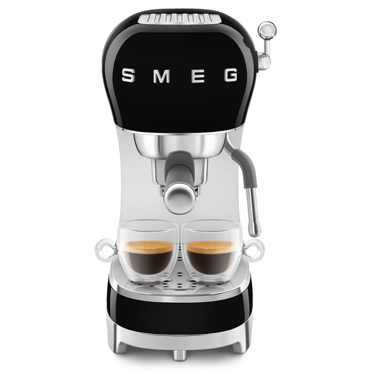 Black SMEG espresso machine with two cups of espresso.
