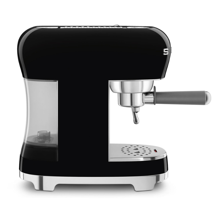 Black Smeg manual espresso machine with silver accents and clear water reservoir.
