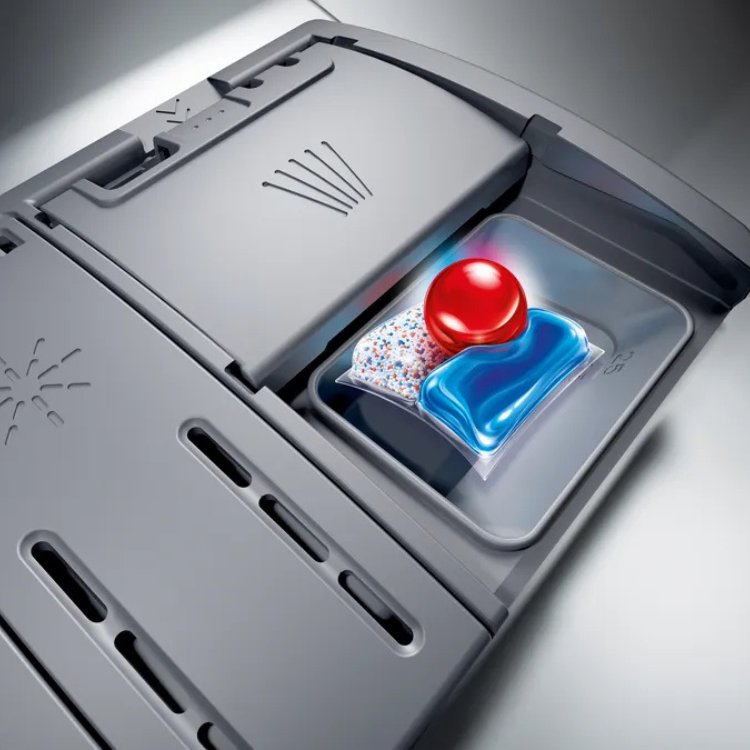Bosch dishwasher detergent dispenser with red button and two compartments.