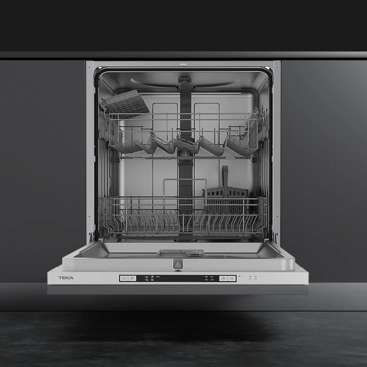 Teka DFI46650 built-in stainless steel dishwasher with open door and empty racks.
