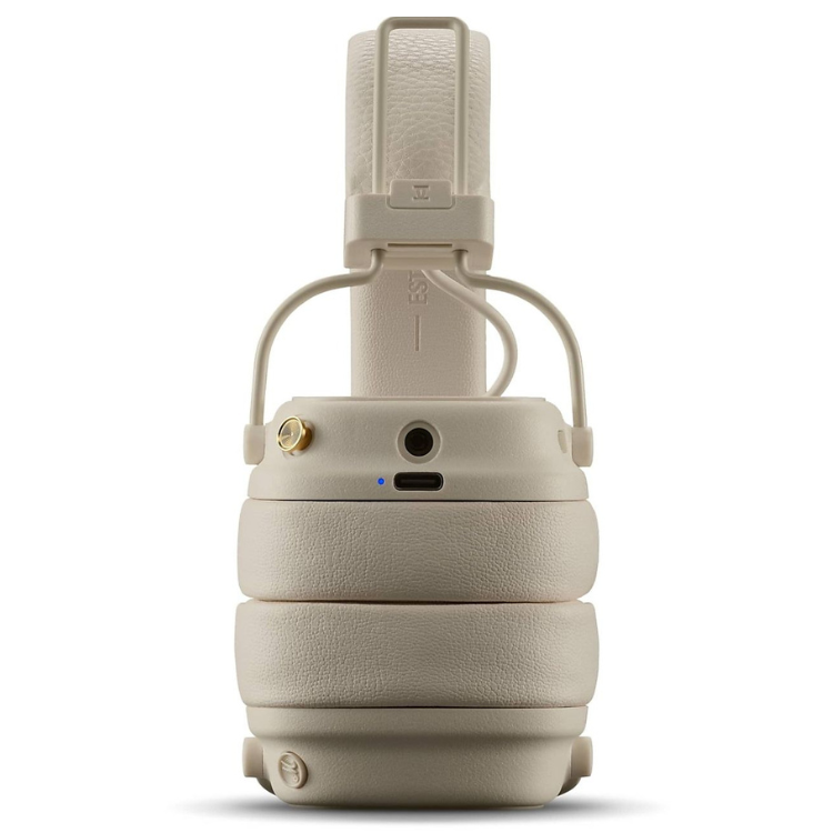 Marshall Major V cream headphones, folded, with leather strap and gold accents.
