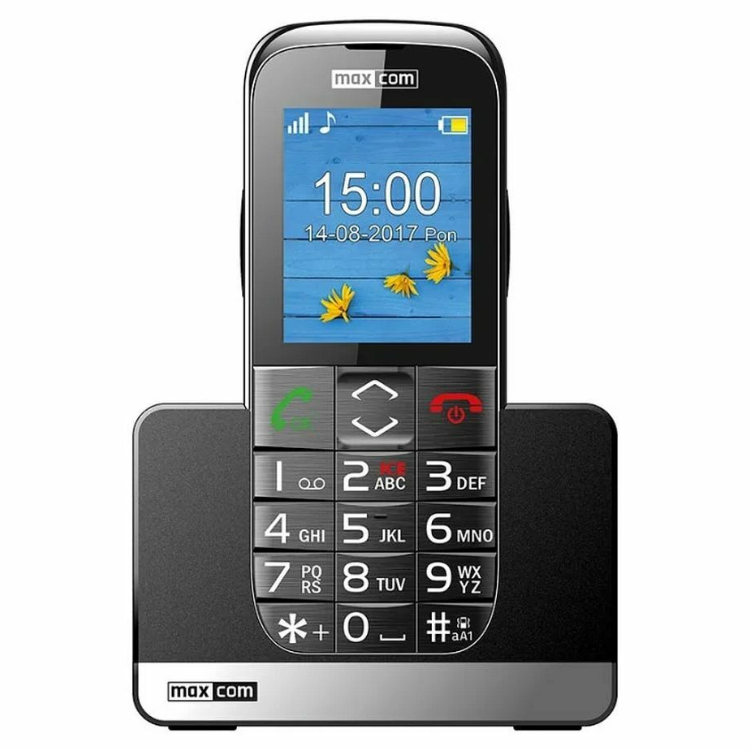 Telemóvel Maxcom Senior MM720 SE Preto, com ecrã a mostrar o relógio e teclado.
