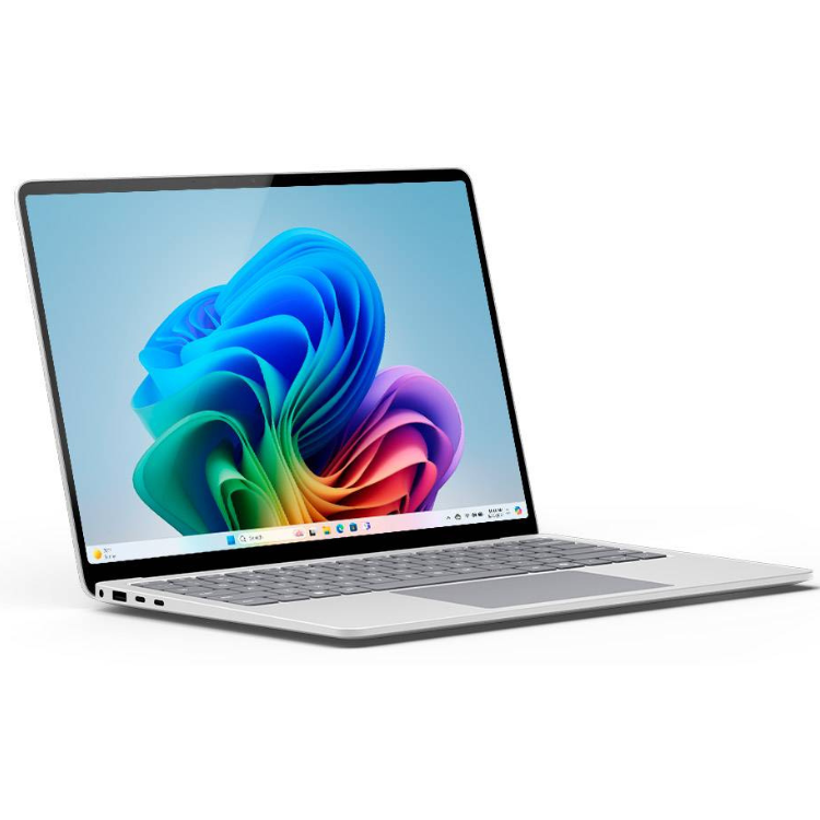 Silver Microsoft Surface Laptop with 13.8" screen and colorful wallpaper on Windows 11.