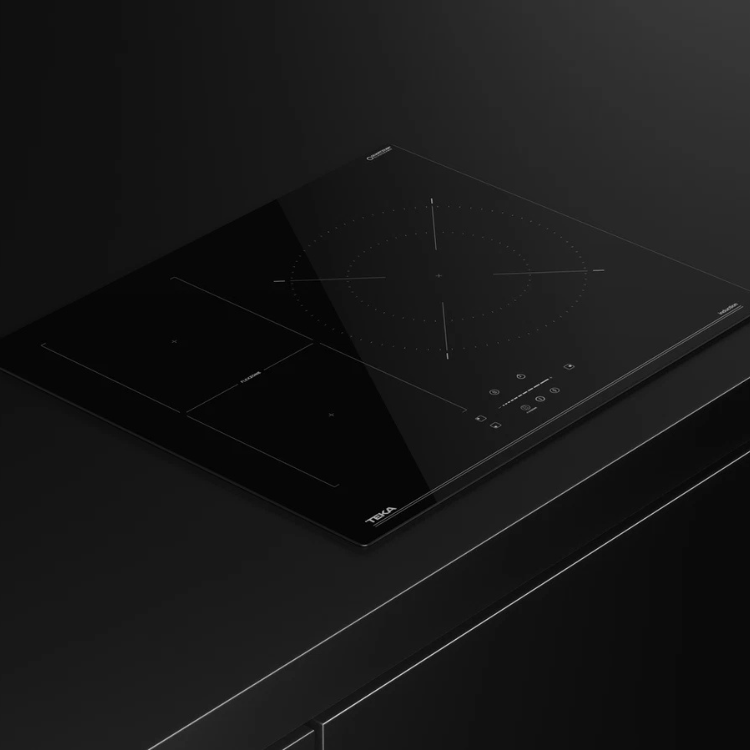 Teka IZC64010MSSBK 7000W 3 Zone Induction Hob, black glass surface.